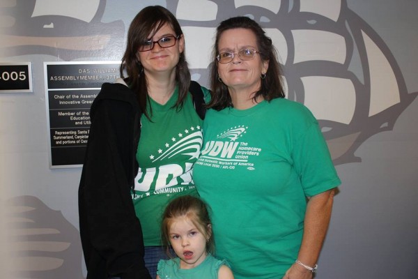 UDW caregiver Claire Kaufman with her daughters